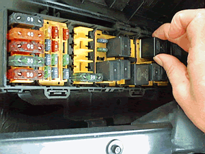 Locate starter relay and remove